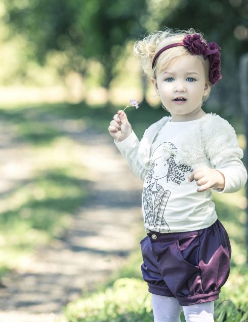 Blusa, colete e shorts